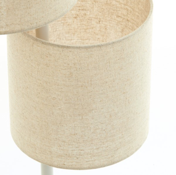 close up on shape and colour of cylindrical shade of floor lamp