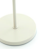 close up on cream circular base of loki floor lamp