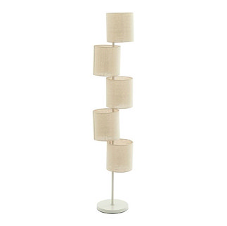 image cut out on white background of multi shade natural coloured floor lamp with circular base