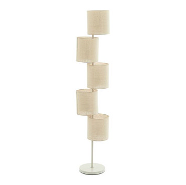 image cut out on white background of natural coloured floor lamp with multiple cylindrical shades along the body, emitting warm glow