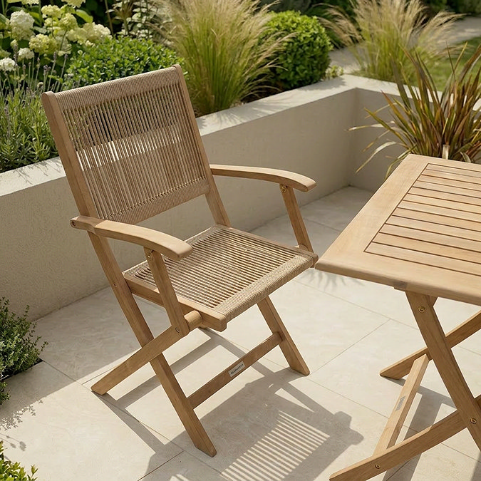 close up image of acacia wood bistro chair