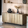 image of smoked oak panelled sideboard with 7 vertical panels, topped with a black vase and a faux plant