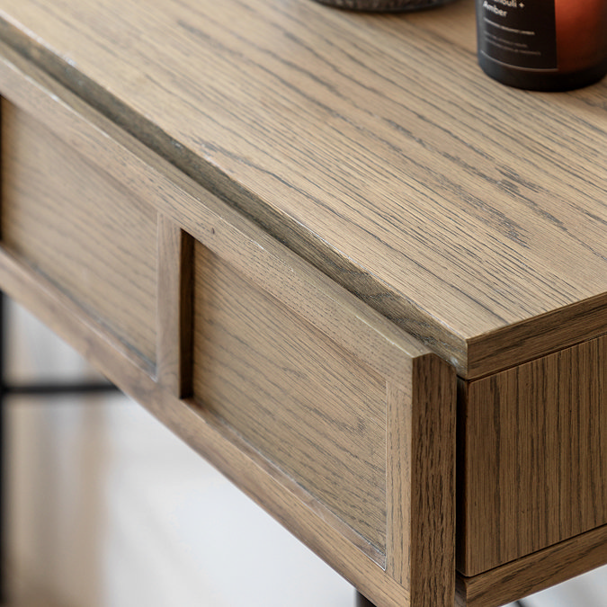 close up image of panelled drawers of smoked oak console table