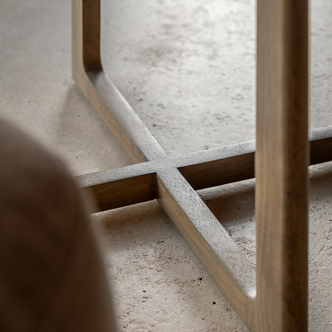 close up on bottom of panelled smoked oak side table