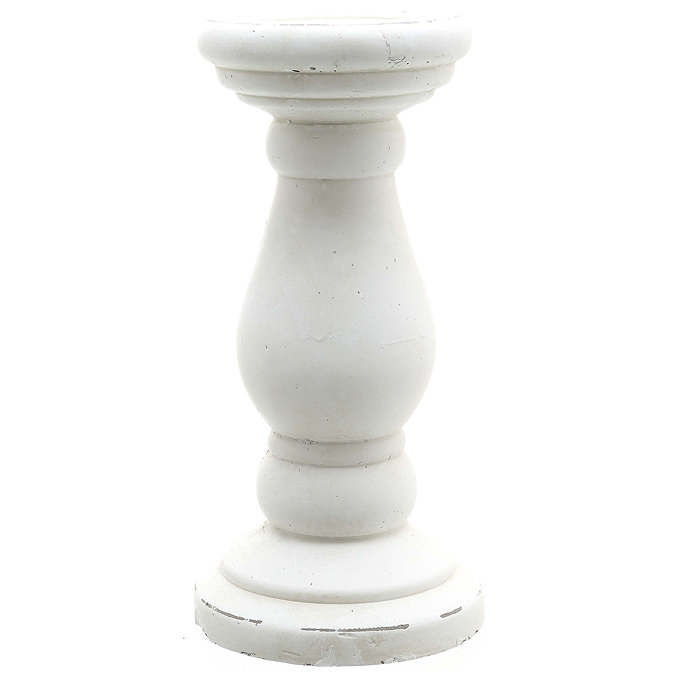 image cut out on white background of white matt ceramic candle holder