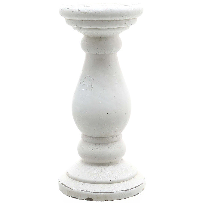 image cut out on white background of matt white column-inspired candle holder