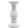 image cut out on white background of matt white column-inspired candle holder