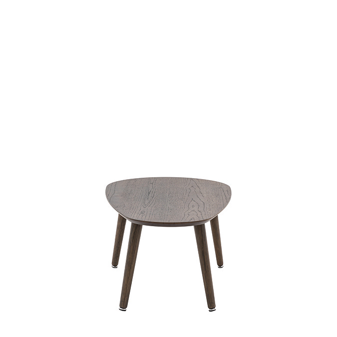 side on image cut out on white background of oval smoked oak coffee table