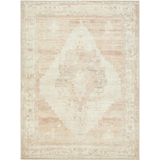 image cut out on white background of tan and ivory rug with vintage patterns