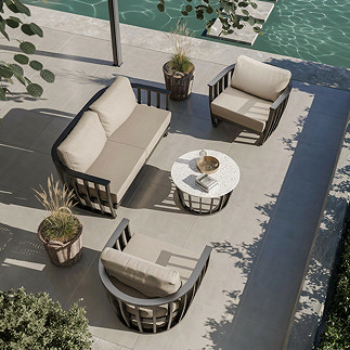 photo taken from above of black contemporary garden lounge set with one 2-seat sofa, 2 armchairs and a coffee table