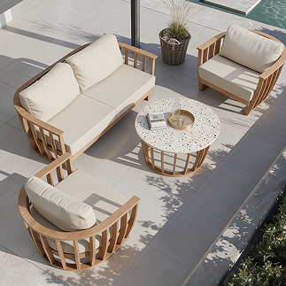 image taken from above of teak coloured garden set featuring two arm chairs, one 2-seat sofa and a round coffee table, on a garden patio