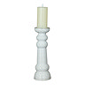 image cut out on white background of ribbed ceramic pillar candle holder