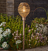 image of faux rattan stake light with top shaped like beehive