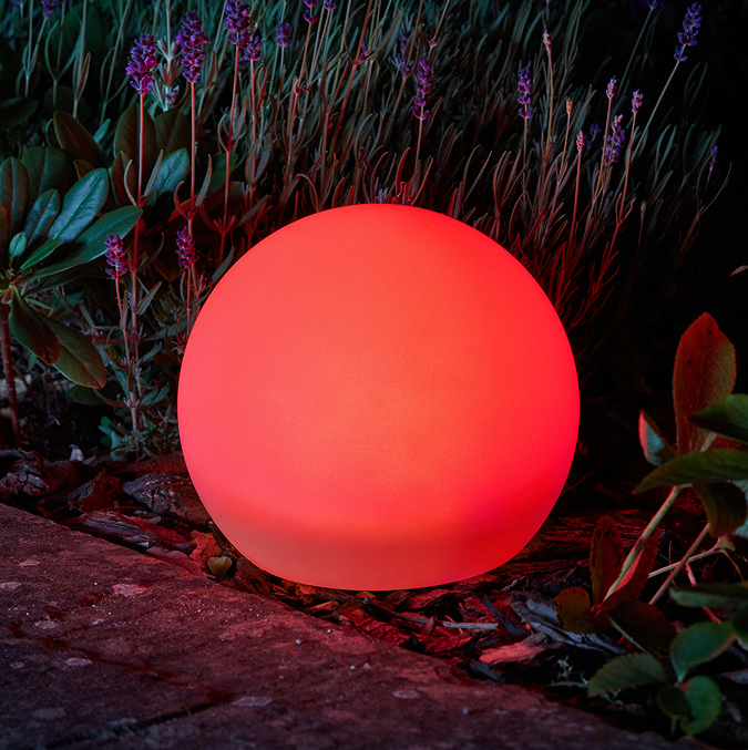 image of garden orb light glowing red