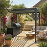 image of aluminium pergola with roof over outdoor bbq and lounge set