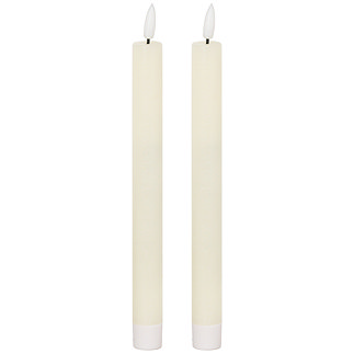 image cut out on white background of pair of ivory LED dinner candles