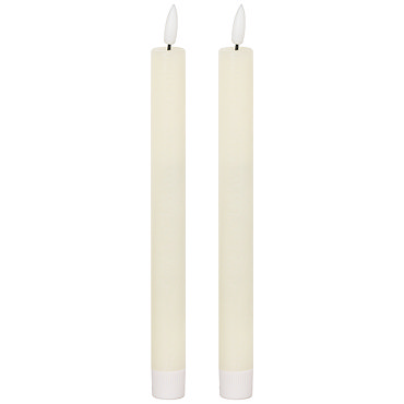 image cut out on white background of ivory LED dinner candle in silver candle holder
