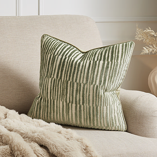 Ada Cut velvet stripe sage cushion 43x43 on settee image 1