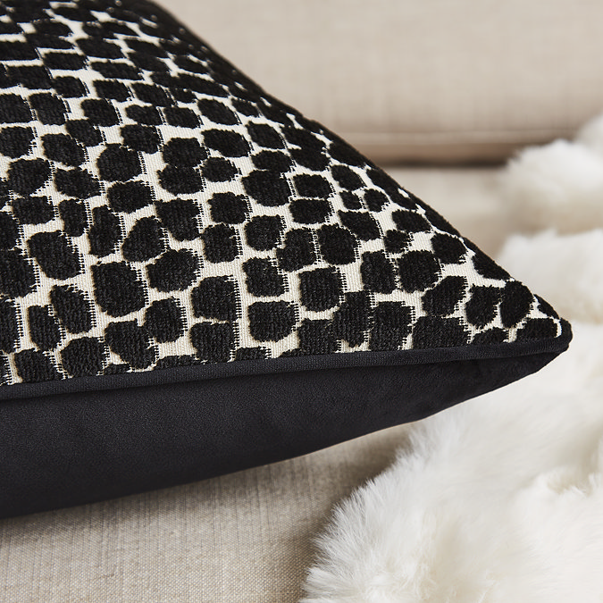 Audrey 55x55cm cushion close up in black image 2