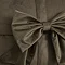 close up image on bow detail on front of chocolate brown velvet cushion