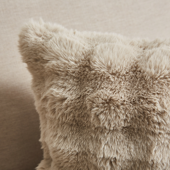 close up image of taupe faux fur bubble cushion