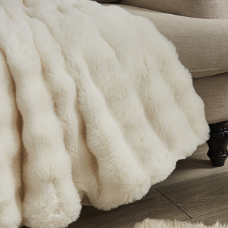 Bubble faux fur throw in cream on settee image 1