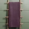 plum coloured velvet throw draped over rustic ladder