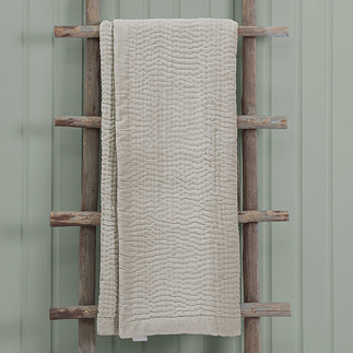 Quartz Luxury Haze Throw Draped Over Wooden Rail