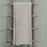 Quartz Luxury Haze Throw Draped Over Wooden Rail