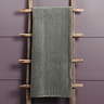 steel grey velvet throw hung on rustic ladder