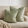 Honeycomb 55x55 sage cushion on settee image 2