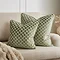 Honeycomb 55x55 sage cushion on settee image 2