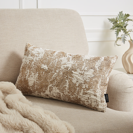 metallic cushion on chair image 1