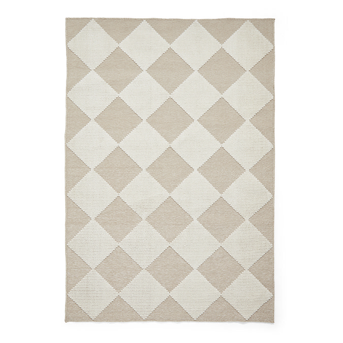 image cut out on white background of beige and white checkered rug