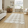 image of angled checkered rug in beige and white on light wooden flooring