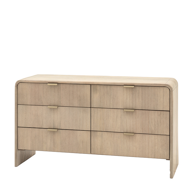 image cut out on white background of six drawer chest, fluted mango wood with brass handles