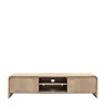 image cut out on white background of mango wood tv unit, empty to show middle shelves and two fluted drawers either side