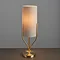 close up on body of conical table lamp with brushed gold base