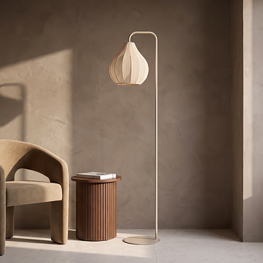 cut out of cream floor lamp with sheer flower bud shade, lit up by bulb