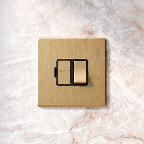 Switched Fuse Spur Satin Brass Lifestyle