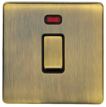 Antique brass cooker switch with neon from angle