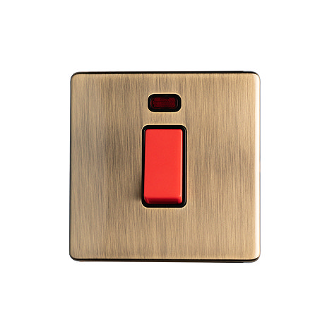 Antique brass cooker switch with neon light cut out