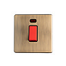 Antique brass cooker switch with neon light cut out