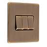 Antique brass 3 gang light switch side angle