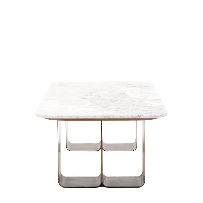 side on cut out of gold geometric base of marble topped coffee table