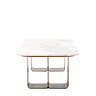 side on cut out of gold geometric base of marble topped coffee table