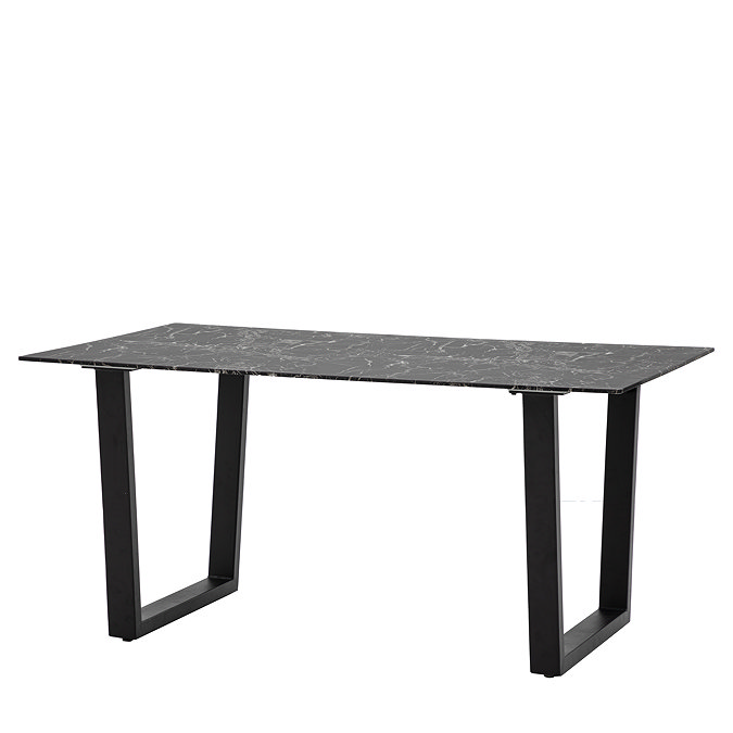 image cut out on white background of black rectangular faux marble glass dining table with angled legs