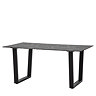 image cut out on white background of black rectangular faux marble glass dining table with angled legs