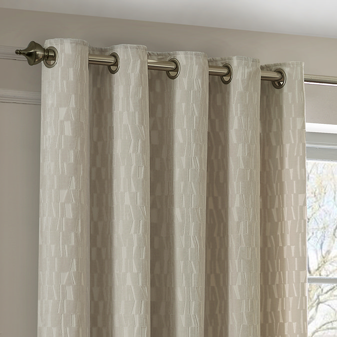 Manhattan Ivory Eyelet Curtains over curtains close up image