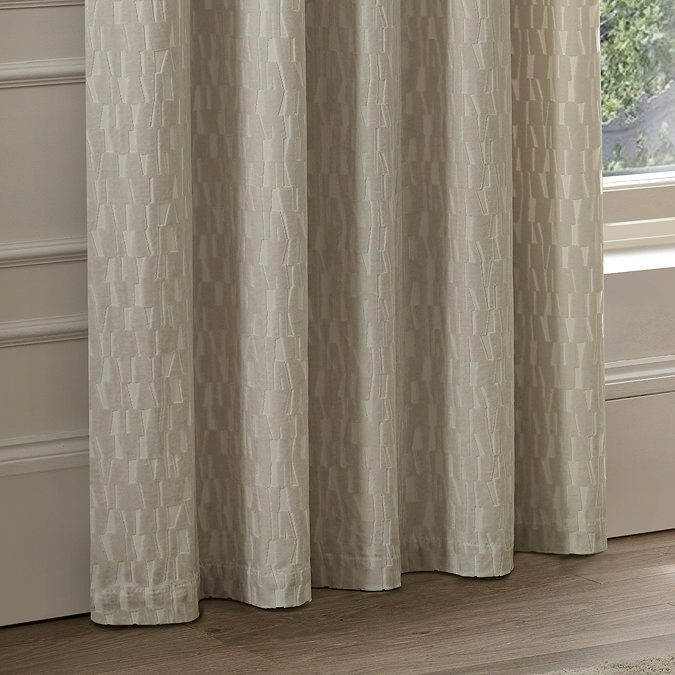 Manhattan Ivory Eyelet Curtains over curtains close up image